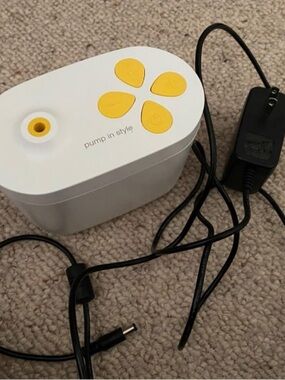 Medela in style breast pump - pump & cord only
